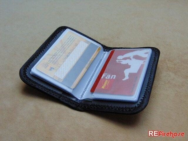 Credit card holder with 24 plastic pockets for pageable and visible cards