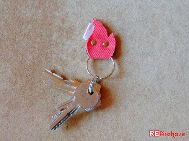 Fire hose keychain firefighter accessory from recycled red colored fire hose